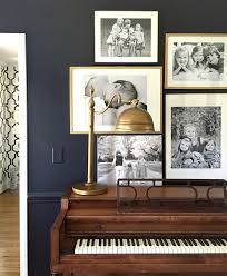 Metal wall decor is bold, durable, and it makes a statement wherever you use it, especially if that space is above your fireplace mantel. Our Black Room Before It S Too Late Emily A Clark Piano Room Decor Piano Living Rooms Trendy Living Rooms