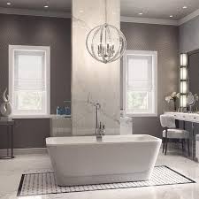 We Can T Get Enough Of This Master Ensuite The Free Standing Tub Complete With Chandelier Above Bathtub Design Kitchen Cabinets In Bathroom Amazing Bathrooms