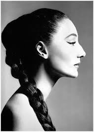 Slick, high pony with a thick braid.