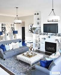 Whether you want bright colors or clean neutrals, traditional furnishings or modern pieces, a family space or a sleek place to entertain, these. Christmas Home Tour Gorgeous Living Room Dressed In Blues Gold Silver And Flocked Greenery Is So Gold Living Room Silver Living Room Blue Living Room Decor