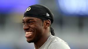 Robert Griffin III pranks Sam Bradford in 'Heisman House' ad