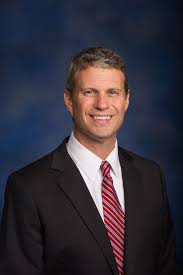 The dictator's son he is a dual canadian. Bill Huizenga Wikipedia