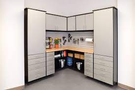 This Silverii Garage System In Black Melamine With Brushed Aluminum Deco400 Door And Drawer Fronts Featur Garage Cabinets Closet Clothes Storage Closet System