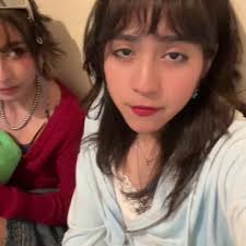 Berna Looking at Danni at Gas Station Video