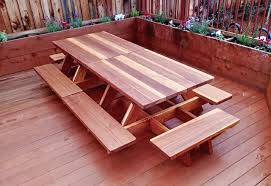 What are a few brands that you carry in wood picnic tables? Kid Size Wood Picnic Table With Attached Benches Forever Redwood