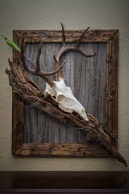 I use small l brackets to mount sheds and then bend them to the right angle to get the antlers to set where i want. Deer Antler Ideas