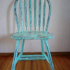 With emphasis on the edges of the furniture, use the sander to gently remove some of the paint and primer allowing the underlying wood to show through. Best Distressed Wooden Chair For Sale In Fort Lewis Washington For 2021
