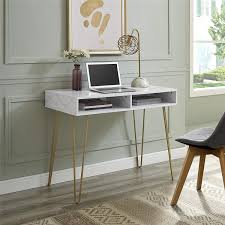 Once the workday is over, stow your laptop and then fold the desktop down for storage. Stylish And Affordable Space Saving Desks From Amazon Popsugar Home
