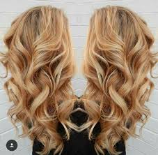 Caramel blonde hair color is unique and stylish balance of blonde and brown that complements a variety of skin tones. Caramel Blonde Caramel Blonde Hair Hair Styles Warm Blonde Hair