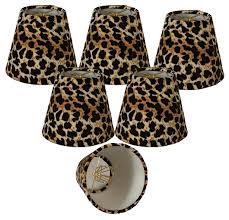 The coffee table provides surface space but visually disappears and there's no need for a floor lamp when you can attach a matching sconce. 5 Black Brown Leopard Print Chandelier Lamp Shade Royallampshades