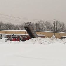 2 men electrocuted when dump truck bed hits wires in South Windsor,  Connecticut