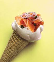 Have you had a chance to try our new spring flavor? Our delectable cream  cheese ice cream is topped with smoked salmon, salty capers and a nice red  onion garnish 😍