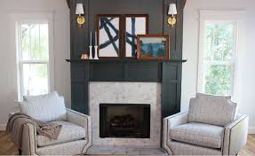 In the case of this living room fireplace by stuart sampley, the brick was painted the same matte black as the rest of the wall.the result is that the brick effect is minimized, and the pattern looks like an intentional architectural element. 12 Gorgeous Diy Faux Fireplace Ideas The Turquoise Home