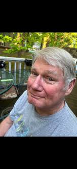 Man gets haircut from wife