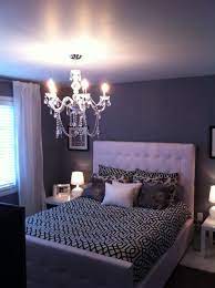 These 10 bedroom chandeliers pull off the look without a flaw. Black And White Crystal Chandelier Modern Bedroom For Small Spaces Chandelier Bedroom Interior Design Bedroom Small Modern Bedroom Decor