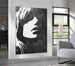 Add class and character to your home with this beautiful black and white portrait of a shaggy haired cow gallery quality canvas print displays vibrant artwork that is built to last. Black White Minimalist Abstract Painting Woman Face Etsy In 2021 Minimalist Abstract Painting Modern Art Abstract Abstract Painting Woman
