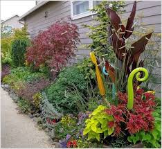 15 Outdoor Structures You Will Fall In Love With Glass Garden Art Garden Art Yard Art
