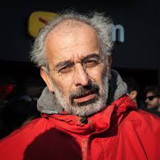 Italian Journalist Gad Lerner Listens To Demonstrators Protesting in Milan,  Italy Editorial Photo