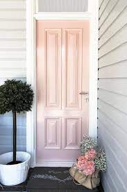 inside kerrie hess s pretty brisbane studio pink front door pink door doors