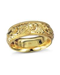 I have been noticing a sudden blackening around my ring fingers and the sides of the adjacent fingers caused by my gold rings. Hand Engraved Yellow Gold Wedding Band Turgeon Raine