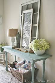 Simple christmas console table decor with rustic sign, tobacco basket and garland. 12 Best Console Table Decorating Ideas And Designs For 2020