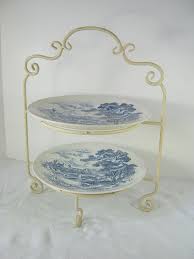 This piece features two levels of bookmatched burled wood veneer with pie crust borders that rest on a pedestal with three cabriole legs. Pin On Cottage Style