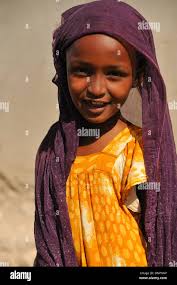 Young Djiboutian girl posing in a street of Balbala district near Djibouti  city, Djibouti, Horn of Africa Stock Photo