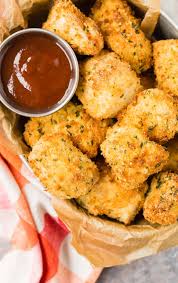 In a large shallow dish, combine the first 6 ingredients. Air Fryer Chicken Nuggets Rachel Cooks