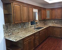 Dark glaze on light cabinets skews even more dramatic and antique by using extra shadows to accentuate surface details. Coffee Glaze Maple Kitchen Cabinets