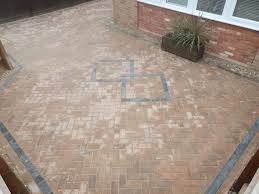 We added a granite step to transition from the street side. Herringbone Block Paving Driveway In Milton Keynes Driveway Patio Experts