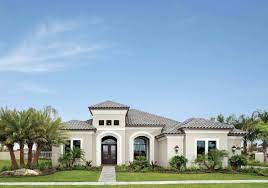 Serving all of central florida. Mediterranean Home With Dark Clay Tile Roof Luxury Homes Exterior Florida Homes Exterior Stucco House Colors
