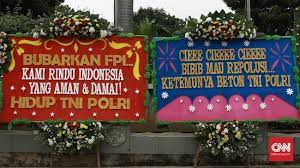 Karangan bunga di medan isone florist, melayani pemesanan karangan bunga pernikahan, berdukacita, peresmian di kota medan, tuntungan, delitua, pancurbatu, sumut. Karangan Bunga Banjiri Kodam Jaya Ada Dari Kaum Punk