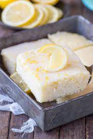 Easy Lemon Sheet Cake Recipe The Best Lemon Cake Made In A 9x13 Inch Pan With A Fresh And Quick Lemon Glaz Lemon Sheet Cake Recipe Sheet Cake Recipes Desserts