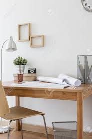 There are tons of different designs and several simple wooden chair plans that help you get through your first tests. Image Of Simple Wooden Desk And Chair In Home Office Stock Photo Picture And Royalty Free Image Image 43941348