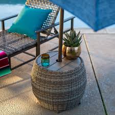 Shop birch lane for farmhouse & traditional umbrella hole outdoor dining tables, in the comfort of your home. Coral Coast Chisholm All Weather Wicker Umbrella Side Table From Hayneedle Com 119 Maybe Outdoor Umbrella Table Umbrella Side Table Patio Umbrella Stand