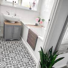 Perfect for the patio, deck, walkways, gazebo, garage, or hard surfaces tiles have a height of 0.5 and allows for ventilation and excess water Mum S Diy Vinyl Bathroom Flooring Transforms This Lacklustre Bathroom