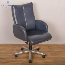 Sit comfortably at your desk with this manager's chair, which features soft faux leather upholstery and tilt and swivel functions for easy customization. Blue Leather Executive Office Chair