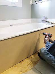 Some whirlpool tubs or spas have a finished side or two, so framing and finishing the side panel are not required. Diy Bath Tub Skirt For Under 25 Jacuzzi Bath Side Panel Transformation