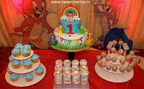 Showcase your birthday treats on a table cover with a table decorating kit and confetti. Baby Tv Theme Dessert Table For Boys 1st Birthday Cake Cakesdecor