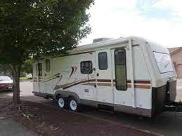 It has a residetial inspired interior with stained hardwood cabinetry. Holiday Rambler Aluma Lite Travel Trailer 1998 Q Uality Vans Suvs And Trucks Cars