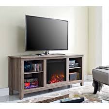 The sinclair electric fireplace tv stand is a traditionally styled and charming piece of furniture that can house up to 65 inch flat screen tvs on top, and has plenty of storage for all your media devices in the center shelf and two side cabinets and drawers. Walker Edison Driftwood 60 Inch Tv Stand With Fireplace Insert Ash Grey W58fp18ag
