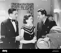 THE SIN OF NORA MORAN, from left: Paul Cavanagh, Zita Johann, Alan  Dinehart, 1933 Stock Photo - Alamy