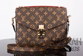 Its flat handles mean it can be carried by hand or worn on the. Louis Vuitton Pochette Metis Monogram Replica Hannah Handbags