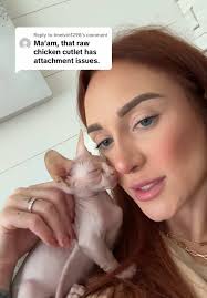 Adorable Sphynx Cat Acting Like a Raw Chicken