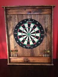 My best friend got married and i wanted to make a personalized gift that represents the fun couple that. Dart Board Cabinet Made From Recycled Pallets Wood Pallet Bed Frame Dartboard Cabinet Diy Dart Board