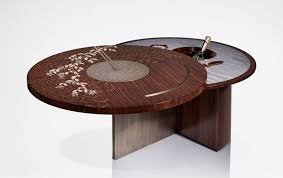 It measures approximately 18 tall which is a standard coffee table height, and a perfect fit with your couch. Top 40 Furniture Innovations In August