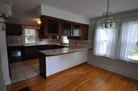 A family embraces the style of their home with a lovely addition for their kitchen and master suite. Updating A 1930s Colonial Gambrel In Maine Before And After