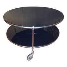 Favorite this post aug 14 Ikea Black Glass Round Rolling Coffee Table Aptdeco