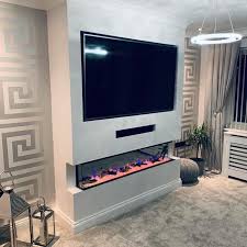 Lastly, the natural fire has its vibe that an electric fireplace cannot give off. How This Living Room Was Transformed With A Media Wall Featuring The Ezee Glow Celestial Built In Electric Fire