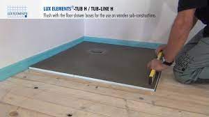 The flatter ones are more comfortable on the feet, easier to clean, and don't need as much grout as. Lux Elements Installation Flush With The Floor Shower Bases Tub H On Wooden Floors Youtube